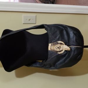 Real Cobra head snake and leather cross body bag.